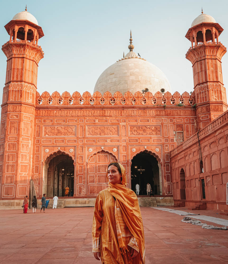 A western women wearing headscarf at Badshahi Mosque in Lahore, Pakistan