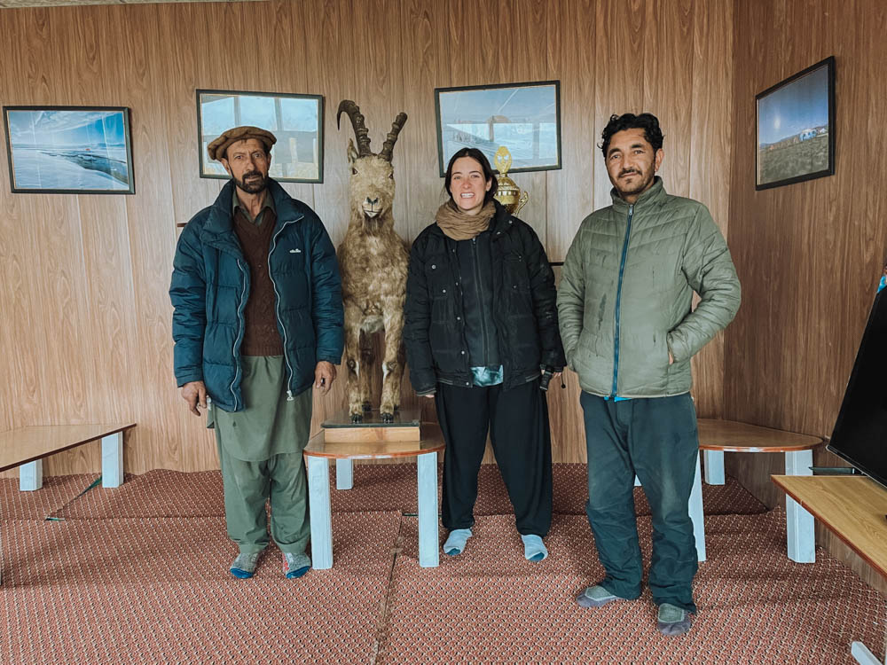 Pakistani villagers welcoming a western tourist to the museum of Chilam