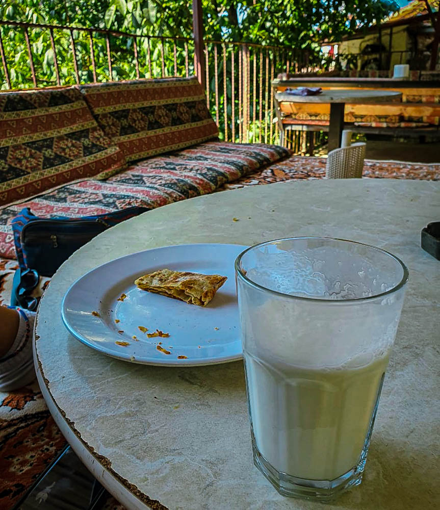 A glass full of the traditional Turkish drink, ayran. 