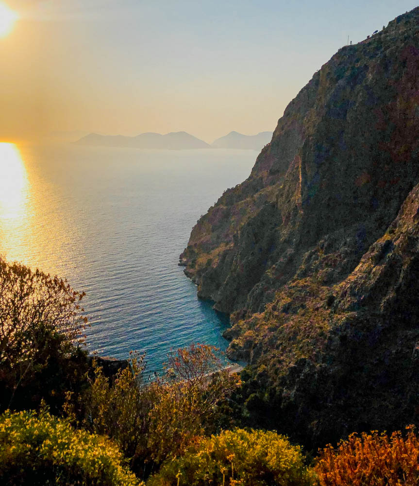 The cliffsides of Butterfly Valley at sunset on the Lycian Way in Fethiye, Turkey. 