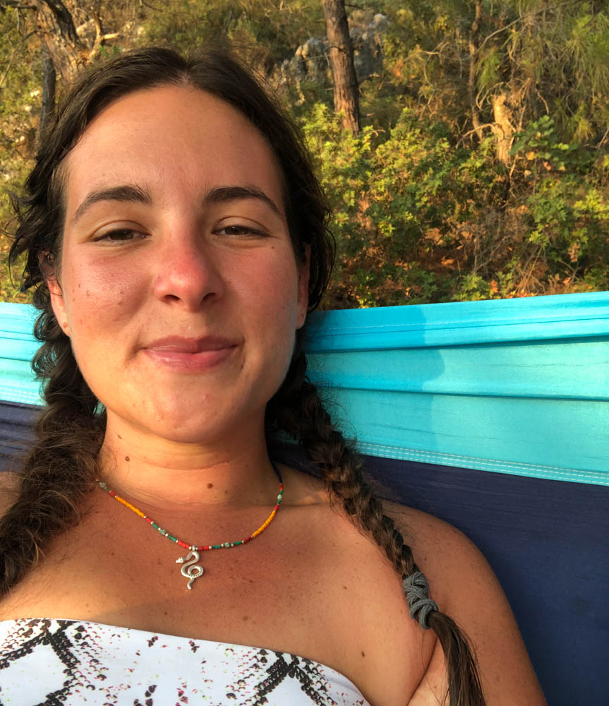 A Lycian Way hiker relaxing in a hammock on the trail in Fethiye, Turkey